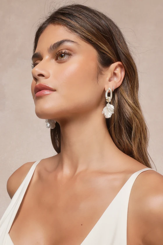 Aphrodite Vibes white rhinestone shell drop earrings, perfect bridal accessory to complement a wedding jumpsuit or dress