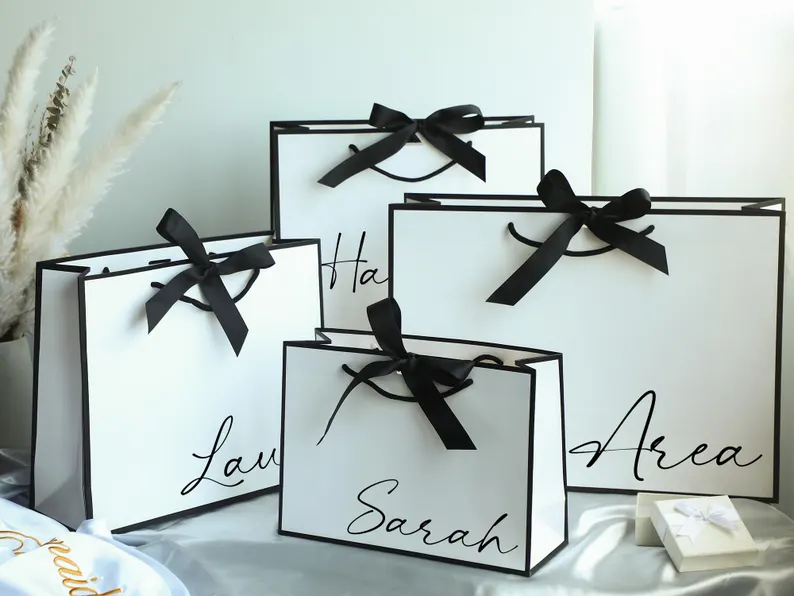 Stylish bridesmaid gift bags ready for wrapping wedding gifts