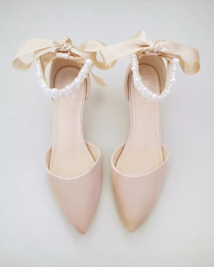 Champagne kitten heels with delicate pearl ankle straps for brides