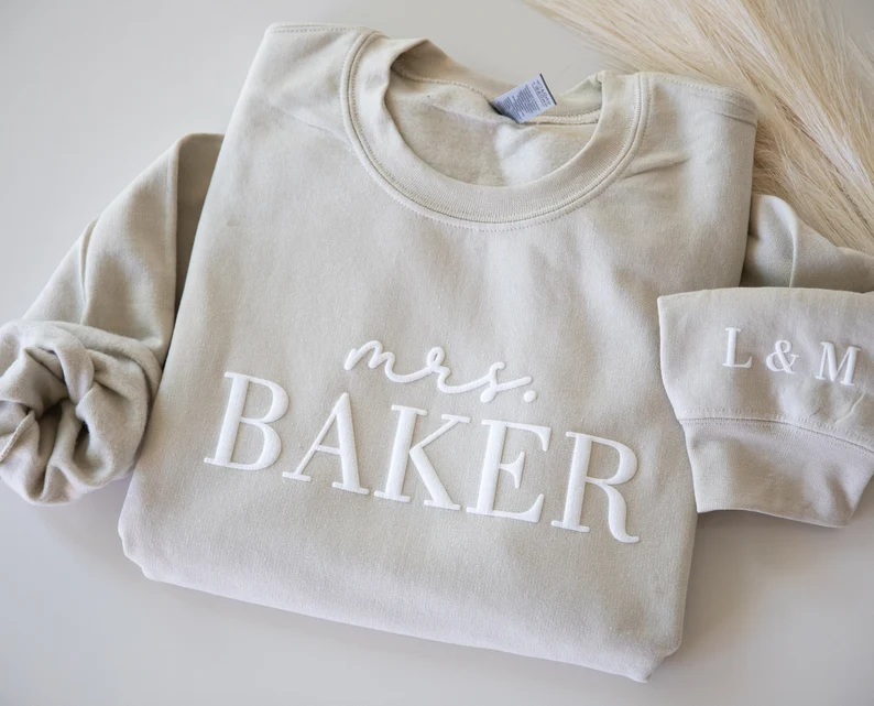 white puff script Mrs sweatshirt for bridal shower or engagement photos
