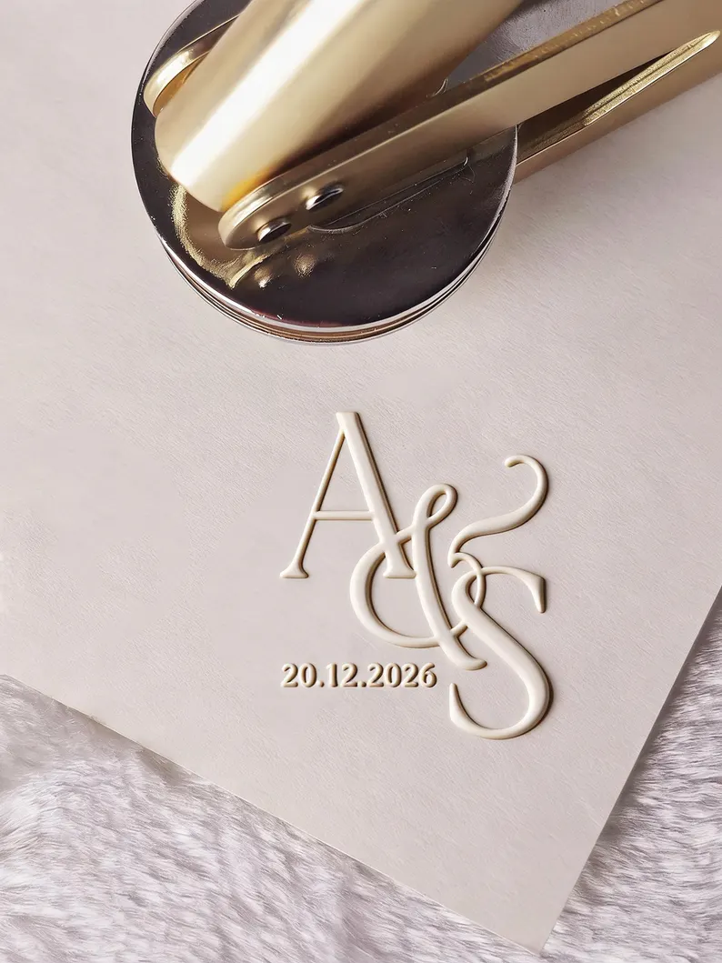 Use a custom wedding embosser to make cheap wedding invitations look elevated