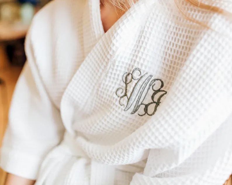 white embroidered bride and bridesmaid robes in waffle knit cotton