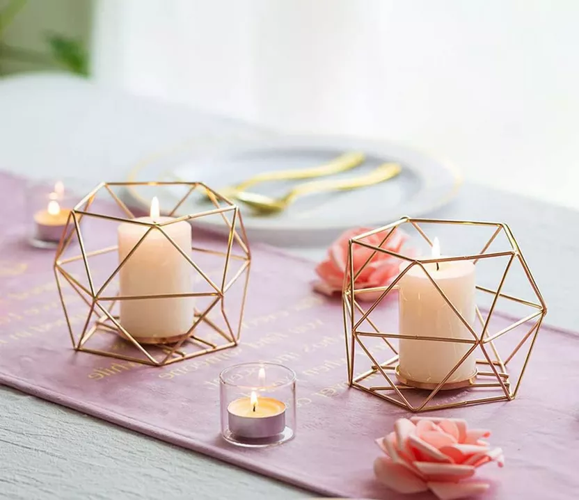 Geometric shaped candle holders for non-floral centerpiece idea