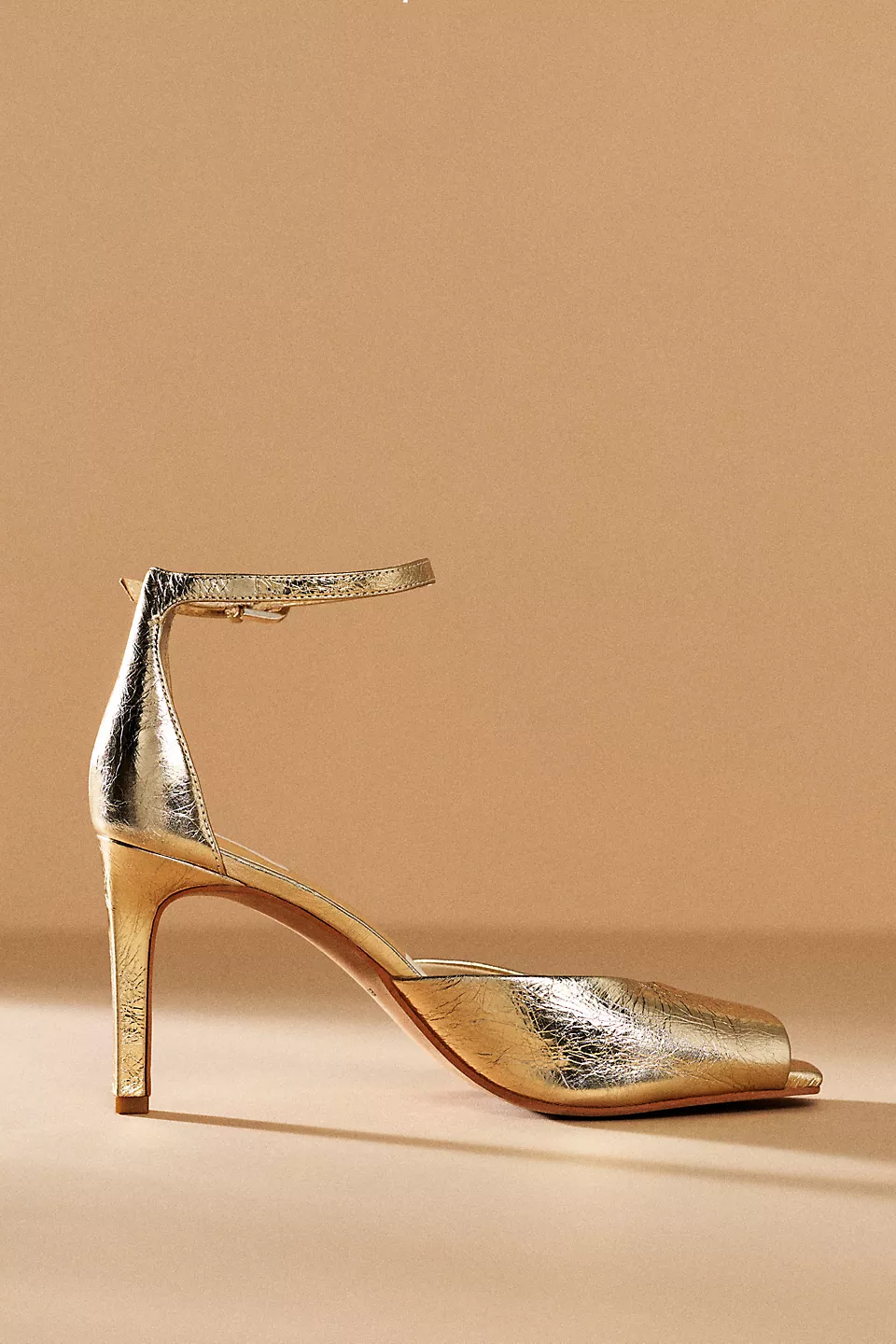 gold leather peep toe pumps