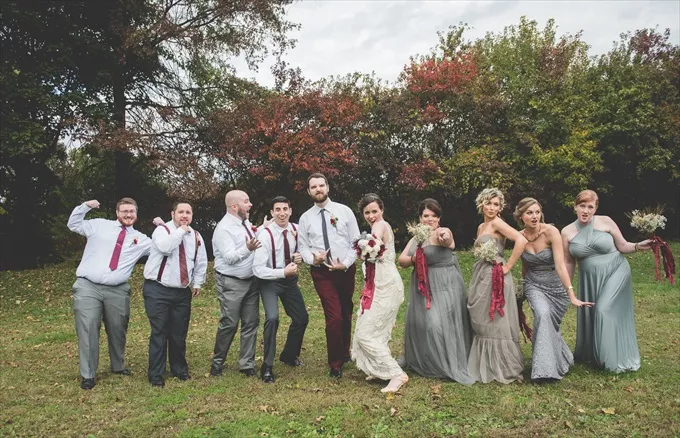 non-jacket groomsmen outfits with groom in different pants as a non traditional wedding look
