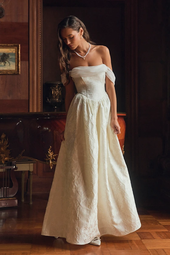 Ivory and cream wedding dresses as flattering alternatives to white