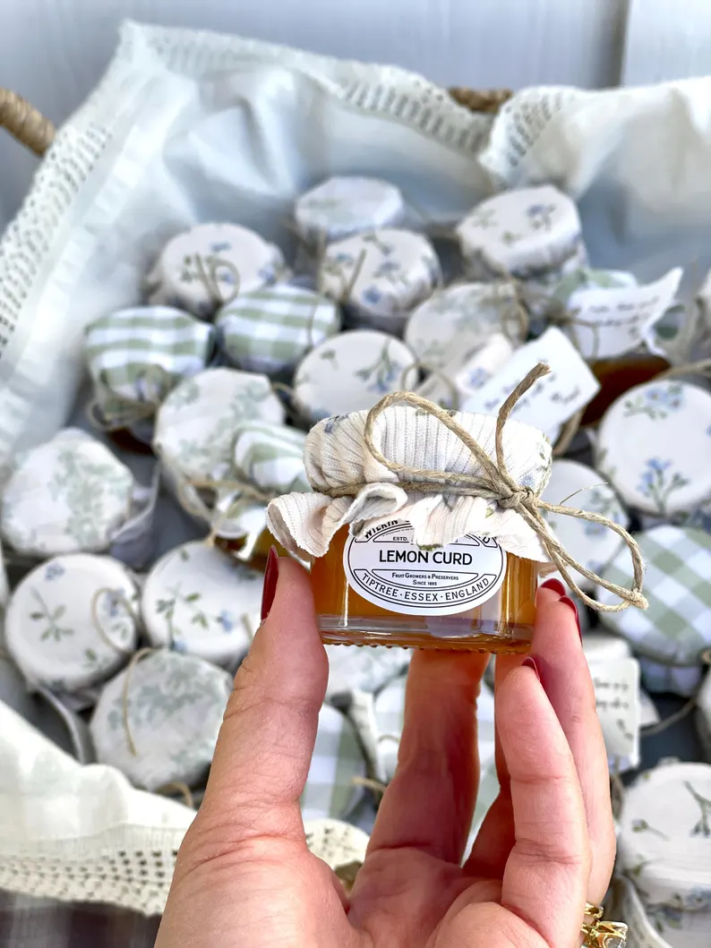 Fresh off the market gingham topped mini jam jars for bridal shower favors