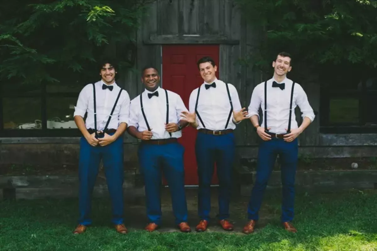 Non-traditional groomsmen outfits for modern weddings, featuring coordinated dress shirts, pants, and accessories