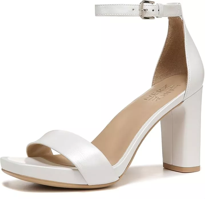 Wide width block heel wedding shoes designed for outdoor weddings, offering comfort and stability on uneven surfaces like grass or stone