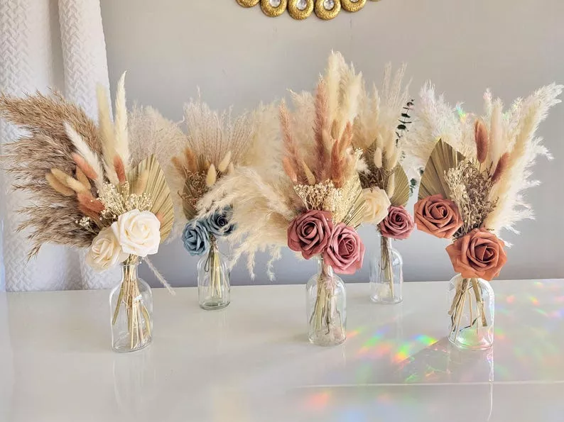 Pampas grass in vases for non-floral wedding centerpieces