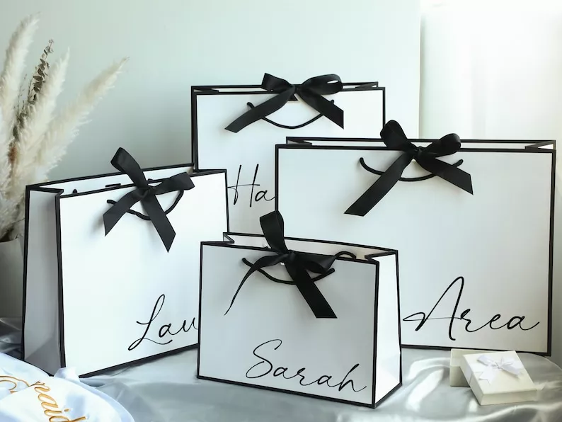 bridesmaid gift bags with names for giving bridesmaids their gifts