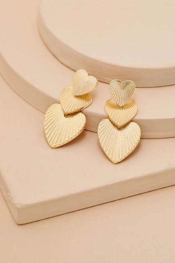 gold textured heart earrings layered for galentines present ideas