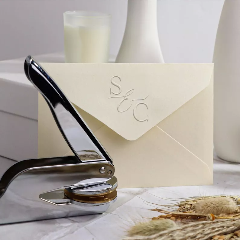 Custom monogram embosser to elevate luxury wedding invitation envelope