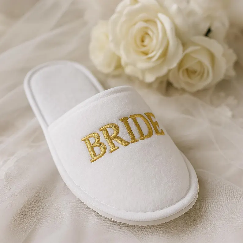 Personalized custom spa slippers for bridesmaids getting ready on wedding morning