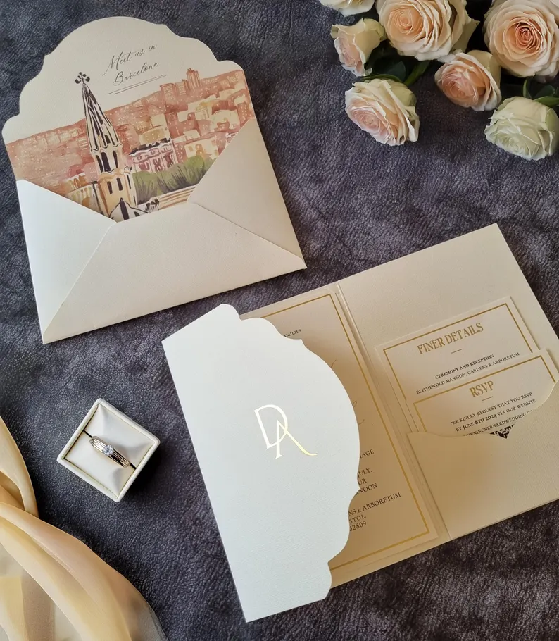Elegant trifold style wedding invitation with scalloped opening and watercolor liner
