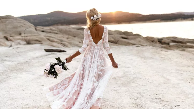 Bohemian style wedding dress from Etsy with flowing skirt and lace details