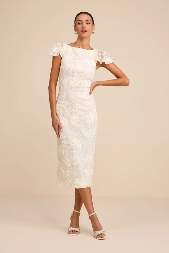 Bride wearing white floral print textured cap sleeve midi dress to the bridal shower