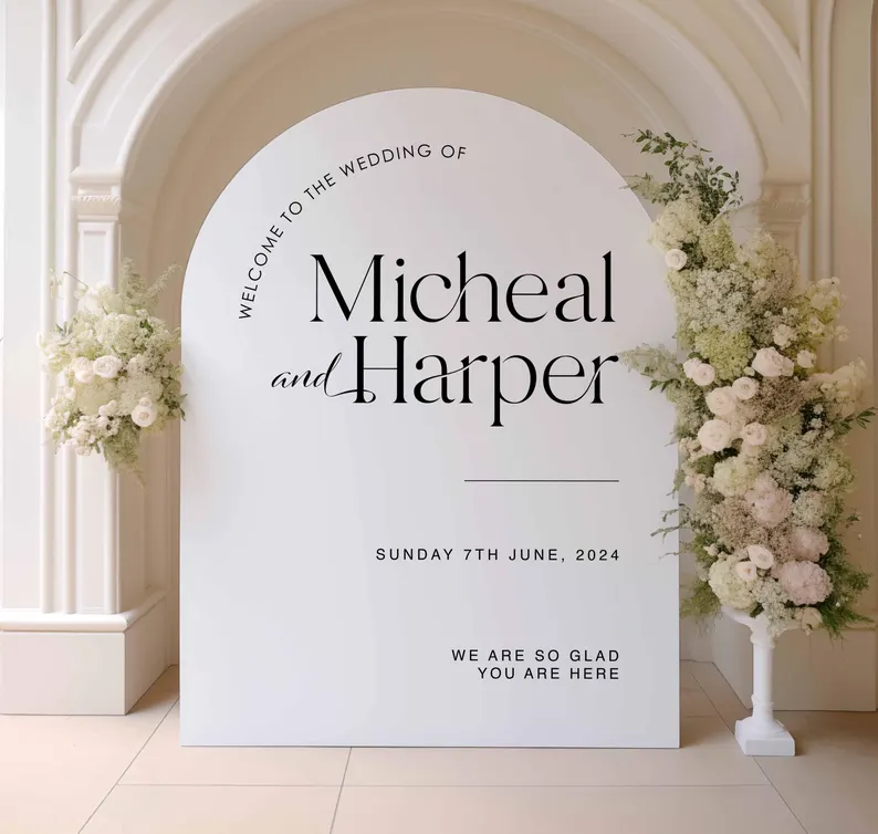 Large acrylic arch shaped wedding welcome sign