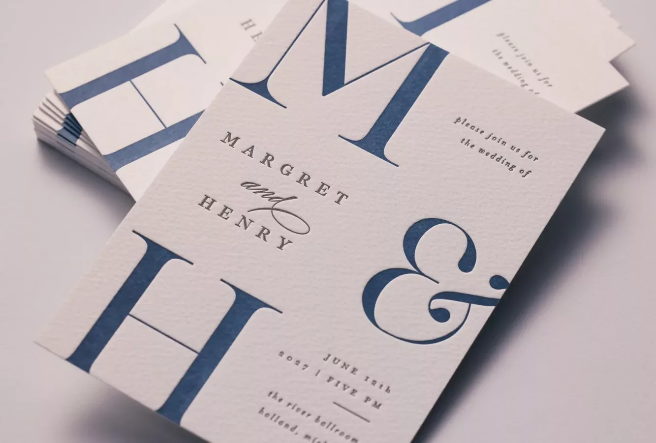 Luxury monogram style letterpress wedding invitation