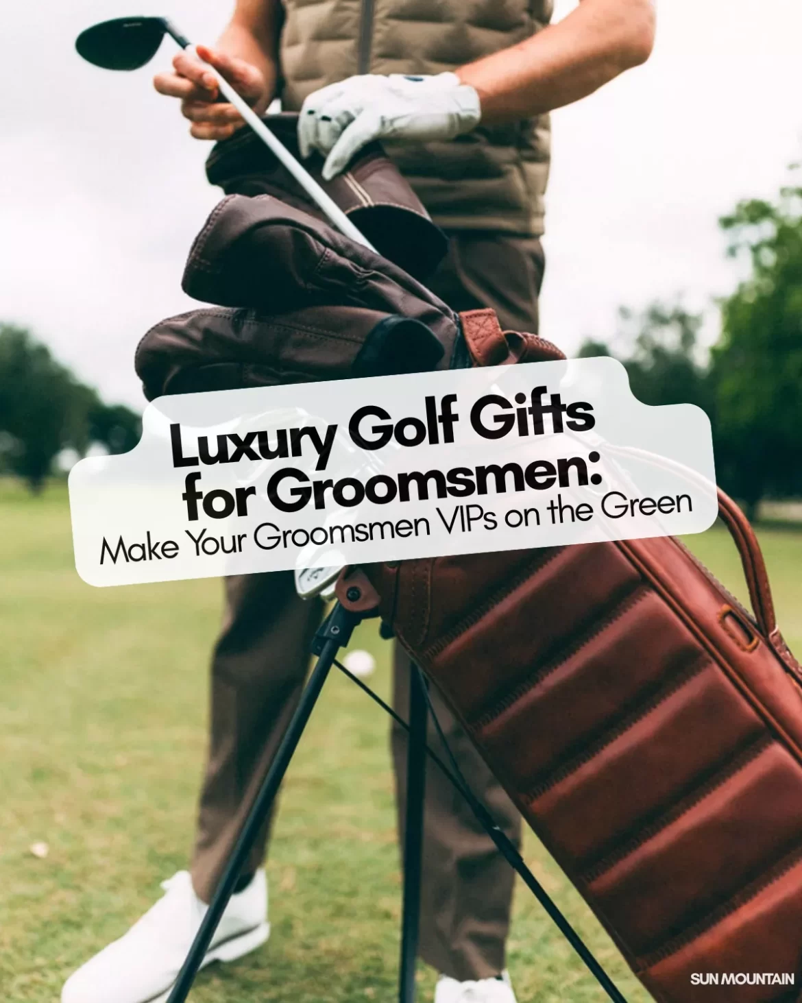 Luxury personalized golf gifts for groomsmen displayed on golf course, perfect wedding gift ideas