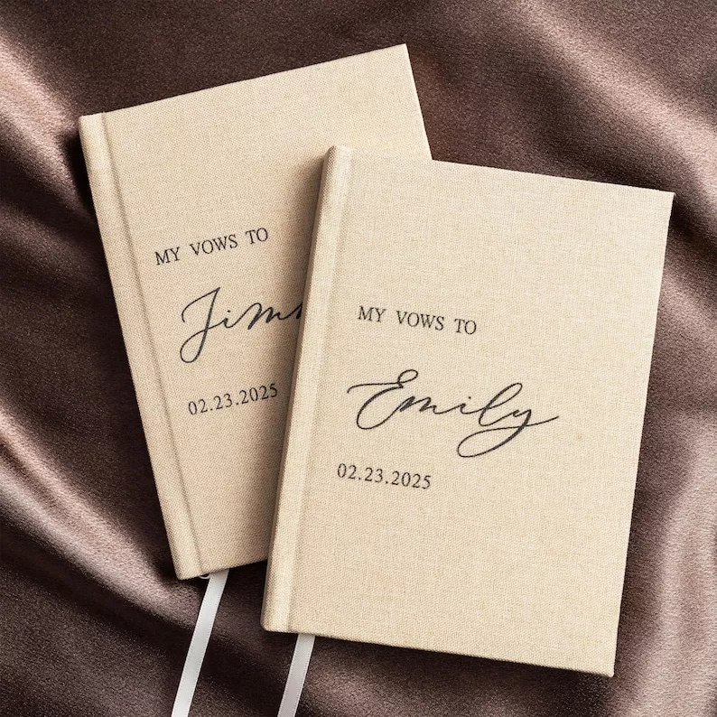 minimalist linen vow books with neutral cover and no his and hers wording