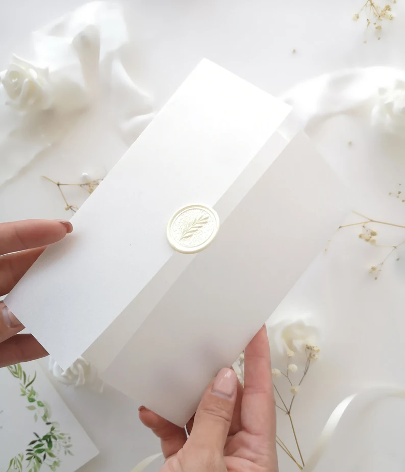 Vellum jackets for elevating the look of luxury wedding invitation suites