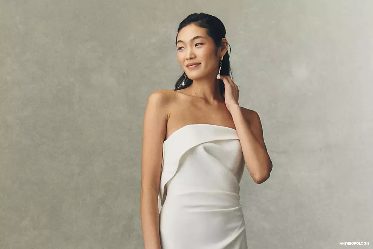 Bride wearing a strapless wedding dress with a coordinated necklace and earrings wedding jewelry set