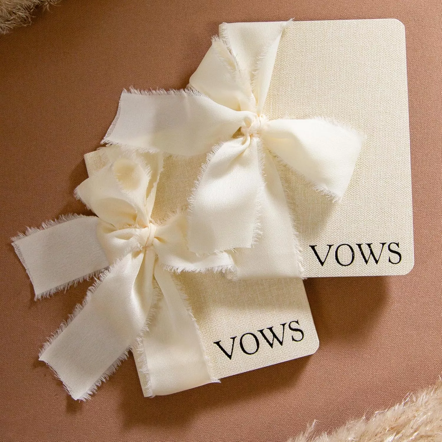 Minimal style vows books with muted color palette and linen ribbon and no his or hers labels