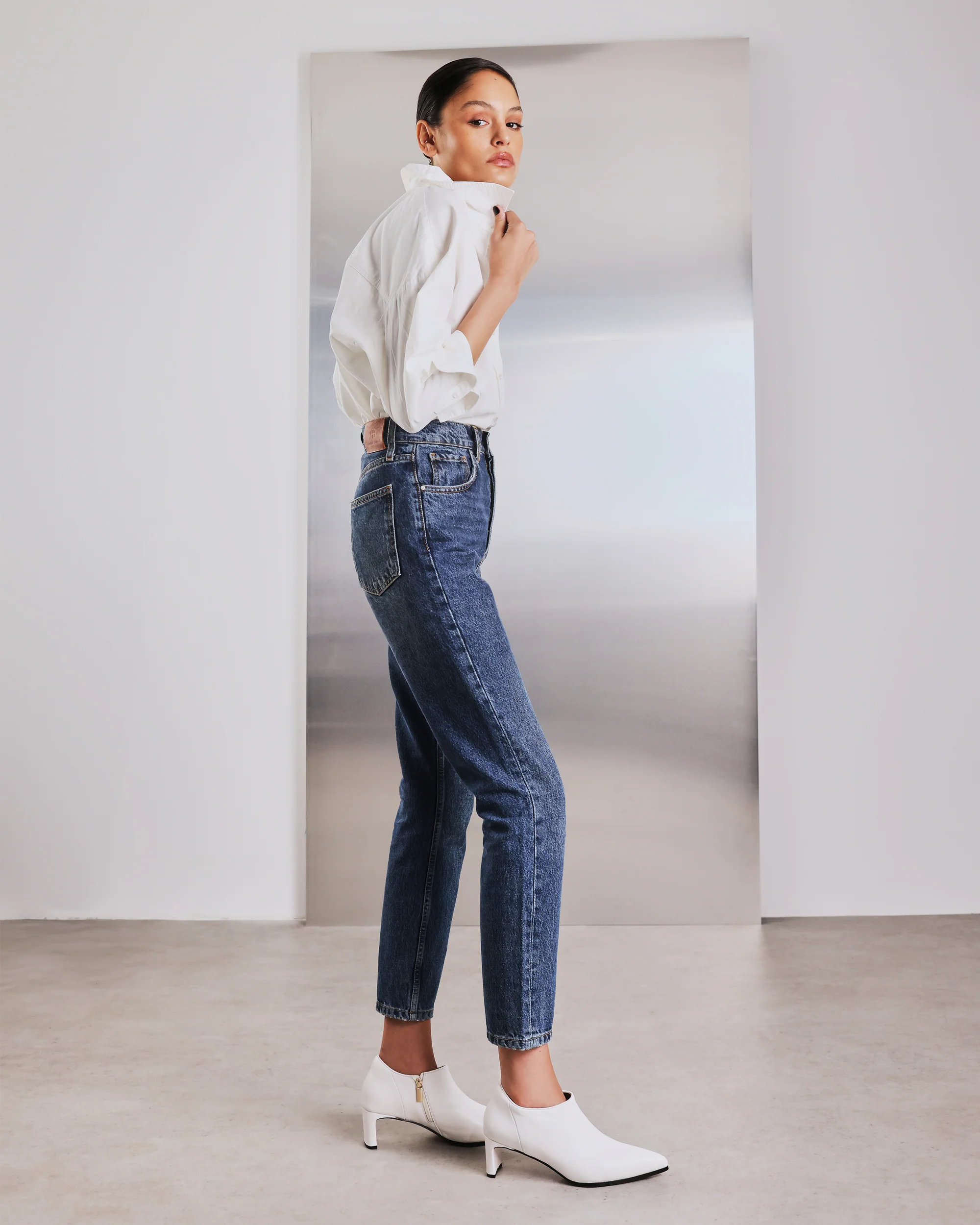 Bride wearing white Habia bridal boots by Bared