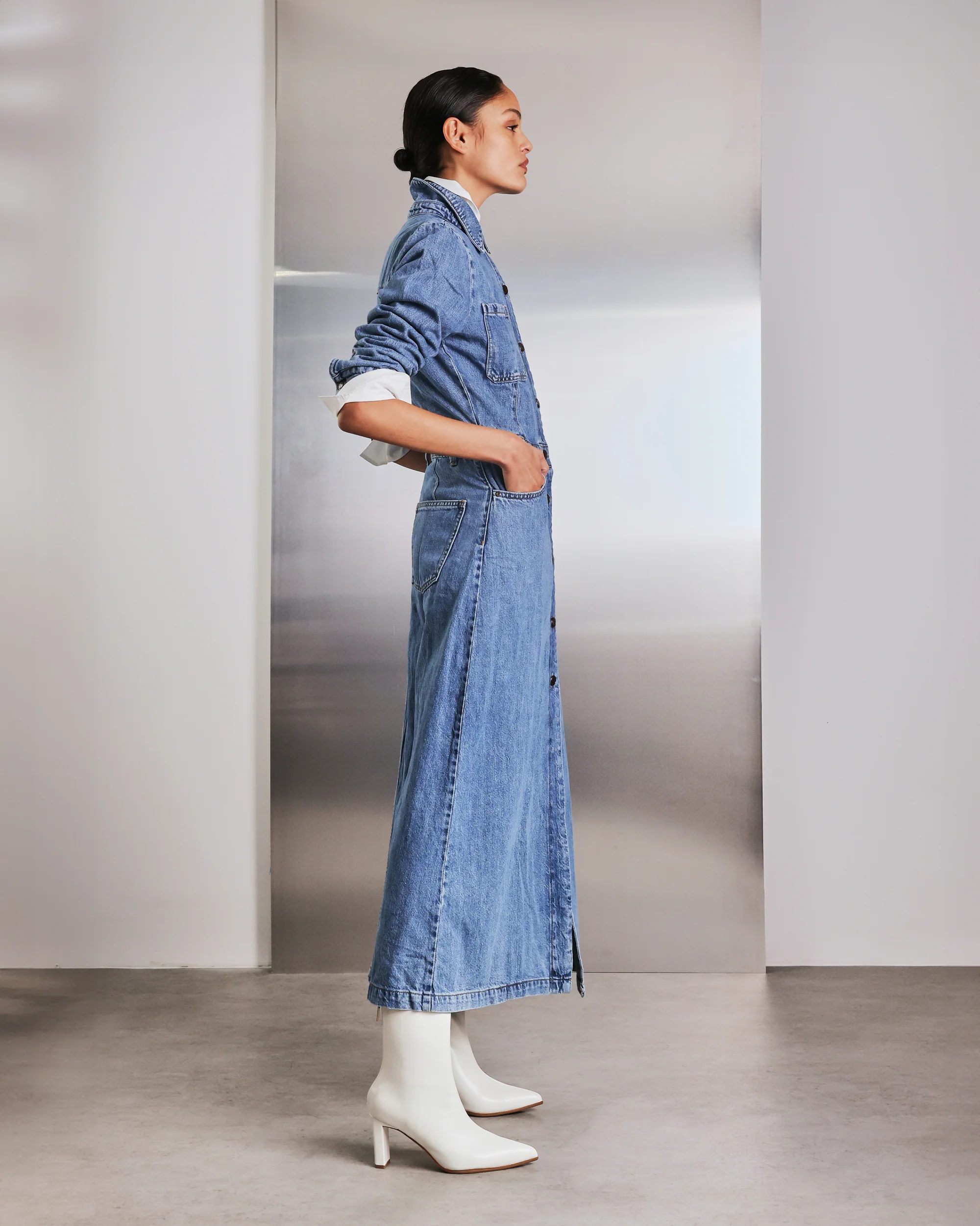 Bride wearing Bared Mino ankle boots styled with a flowing lace wedding dress, ready for dancing