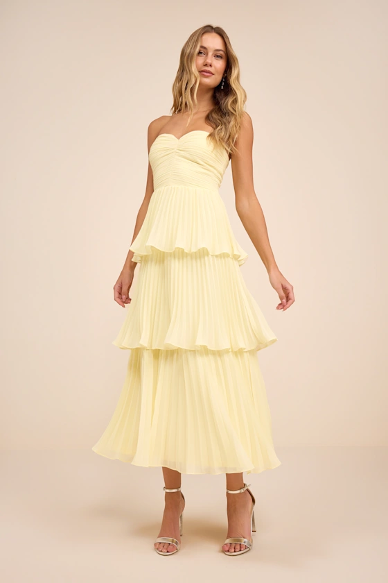 Yellow tiered pleated midi dress for a garden wedding guest outfit