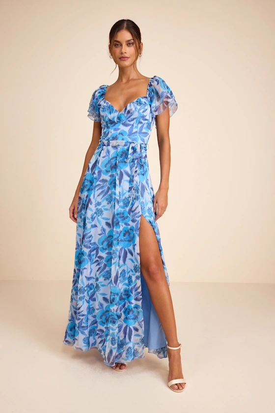 guest wearing ruffled sleeve beach wedding guest dress in blue