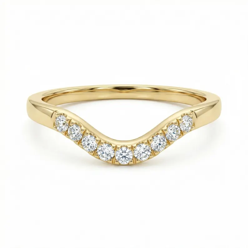 curved wedding band for oval engagement ring flush fit diamond pairing