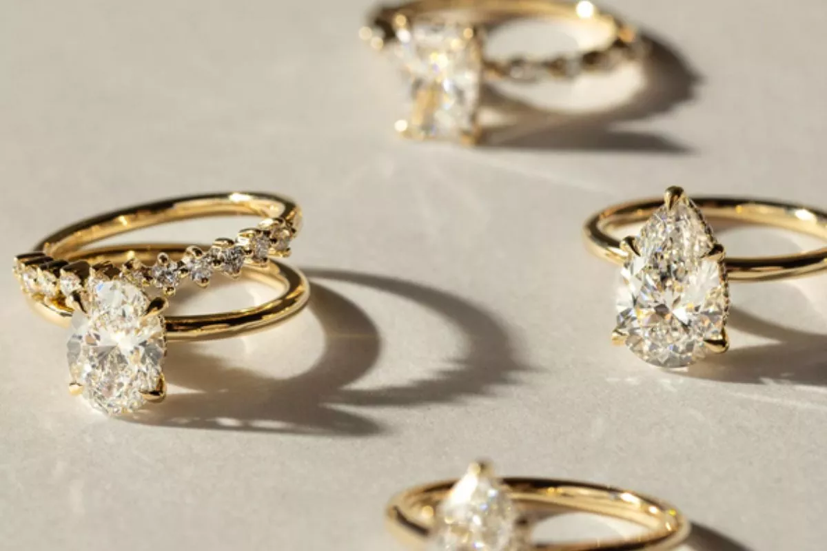 different engagement rings styled to match classic, modern, romantic, and bold wedding themes