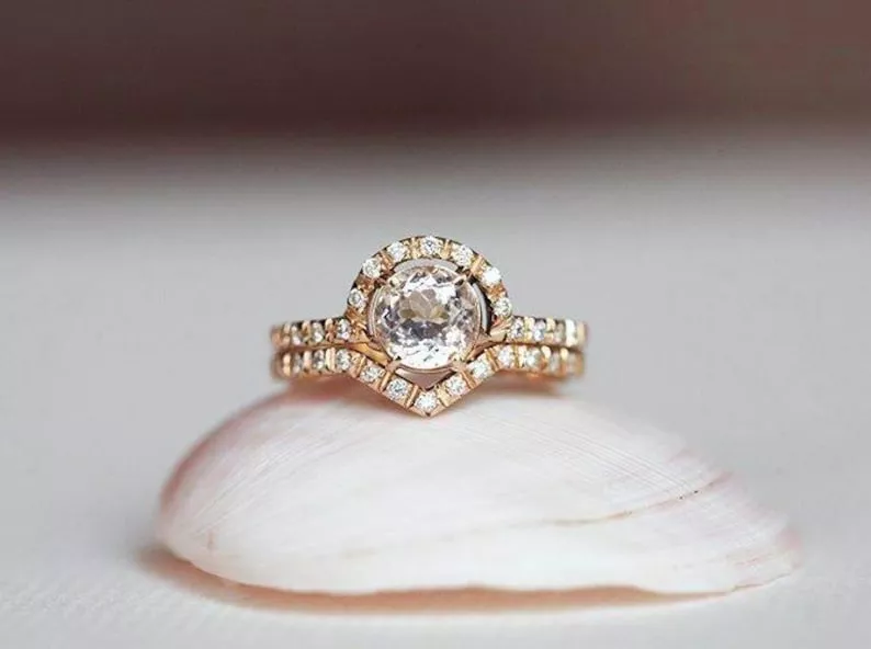 halo engagement ring with contour wedding band