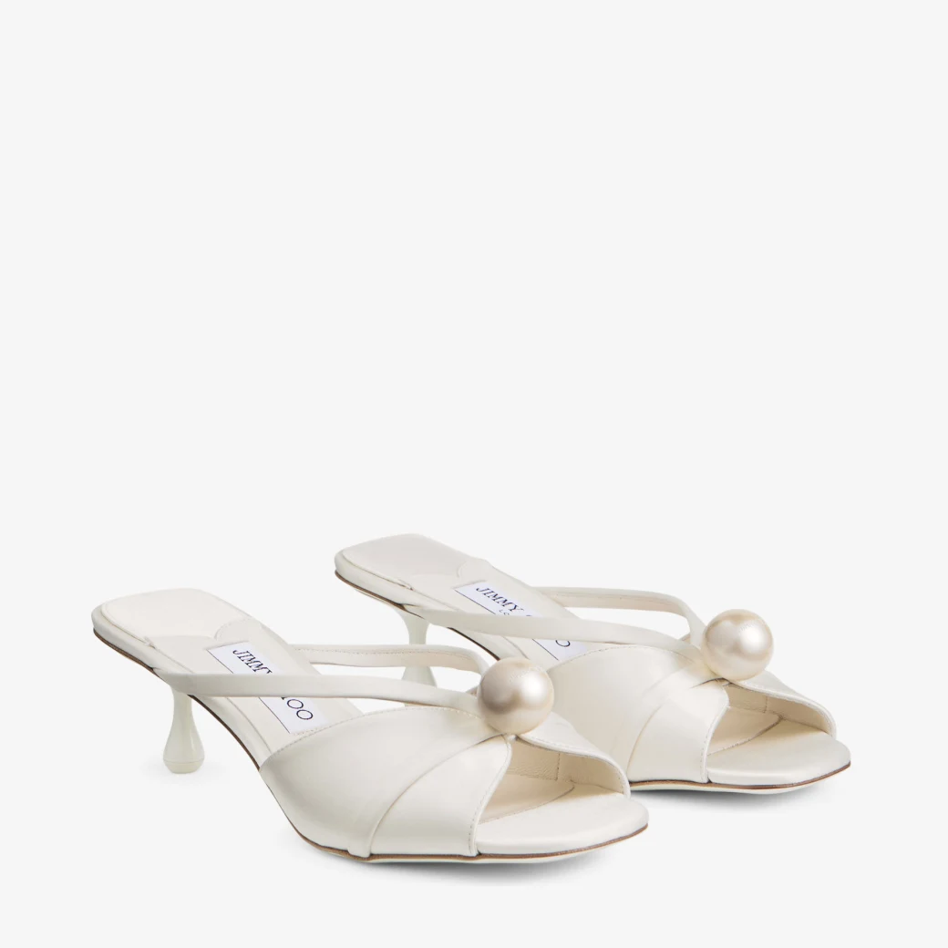 ivory satin bridal mules with pearl embellishment for wedding