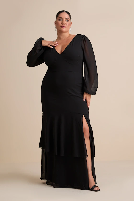 black long sleeve mother of the bride dress that flows away from belly
