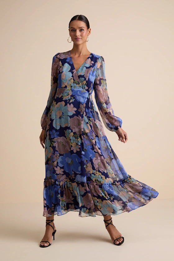 navy floral wrap dress with long sleeves worn by guest for beach wedding attire