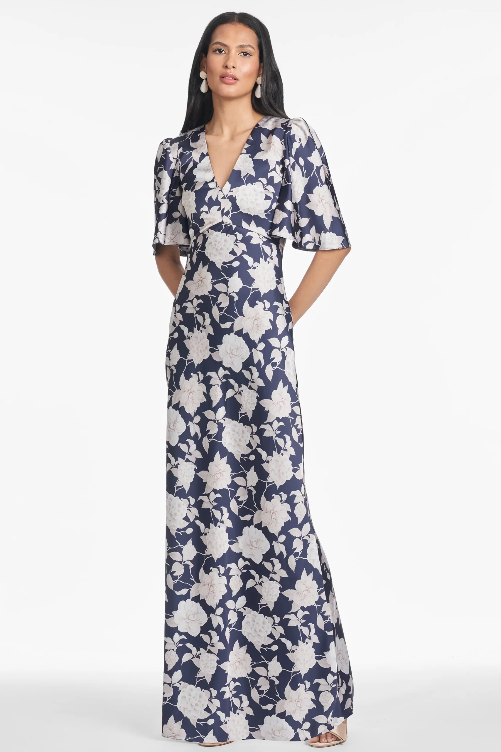 guest wearing beach wedding guest dress with elbow sleeves