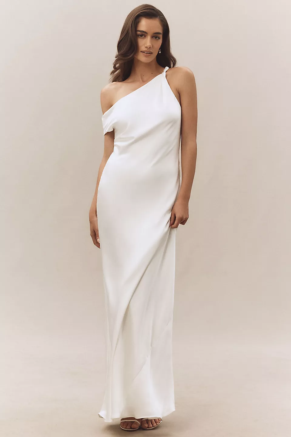 bride in an elegant one-shoulder luxurious bridal shower gown