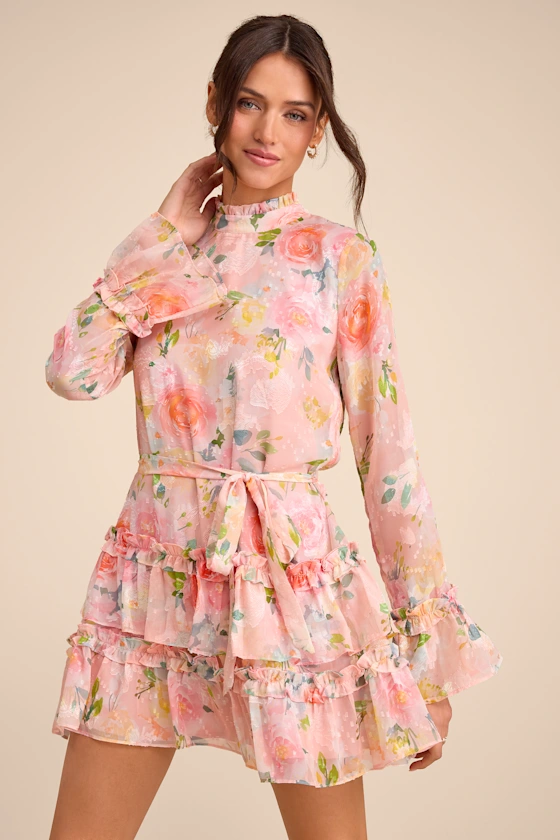 guest wearing mini pink floral beach wedding guest dress with sleeves