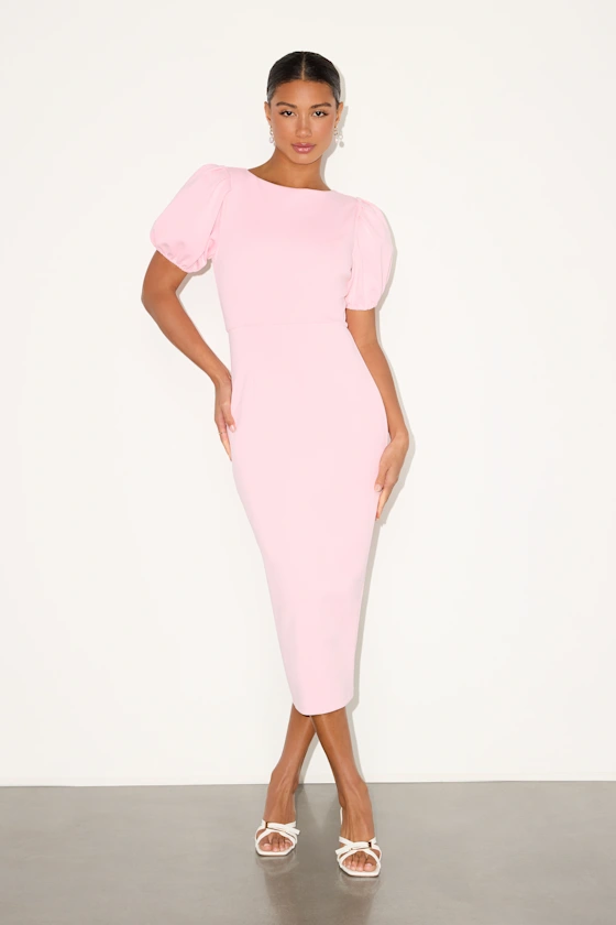 guest wearing puff sleeve pink bodycon midi for beach wedding guest dress