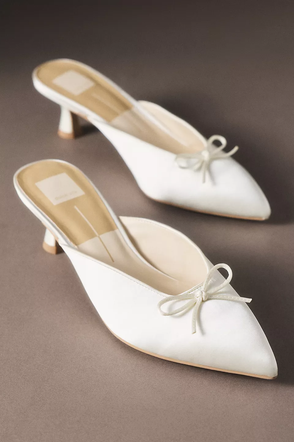 ivory bridal mules with romantic pearl bow perfect for bride