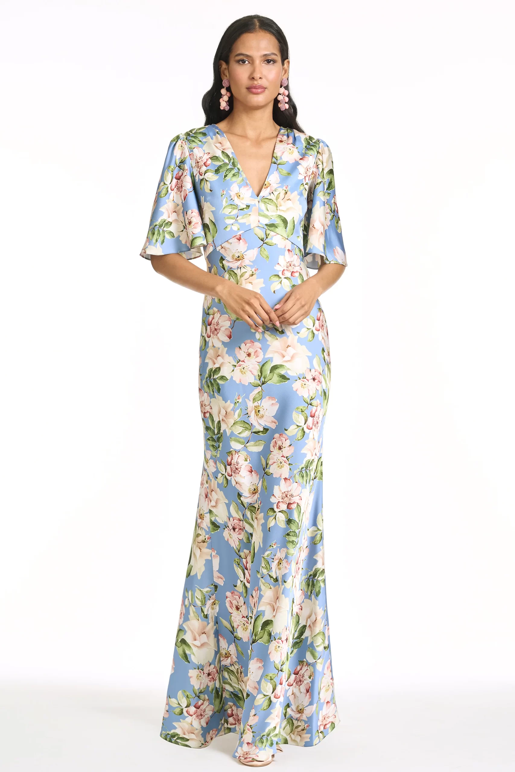 guest wearing satin flutter sleeve beach wedding guest dress