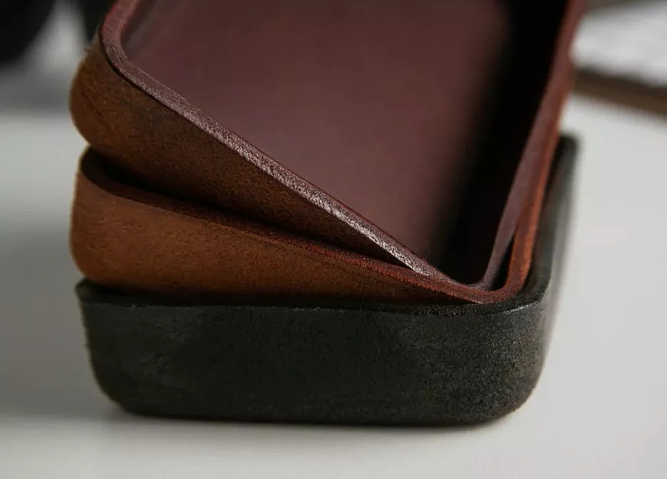 close-up of vegetable-tanned leather showing natural texture and patina on valet tray