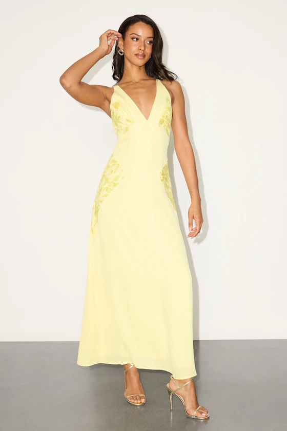 bride wearing yellow bridal shower dress in lieu of white