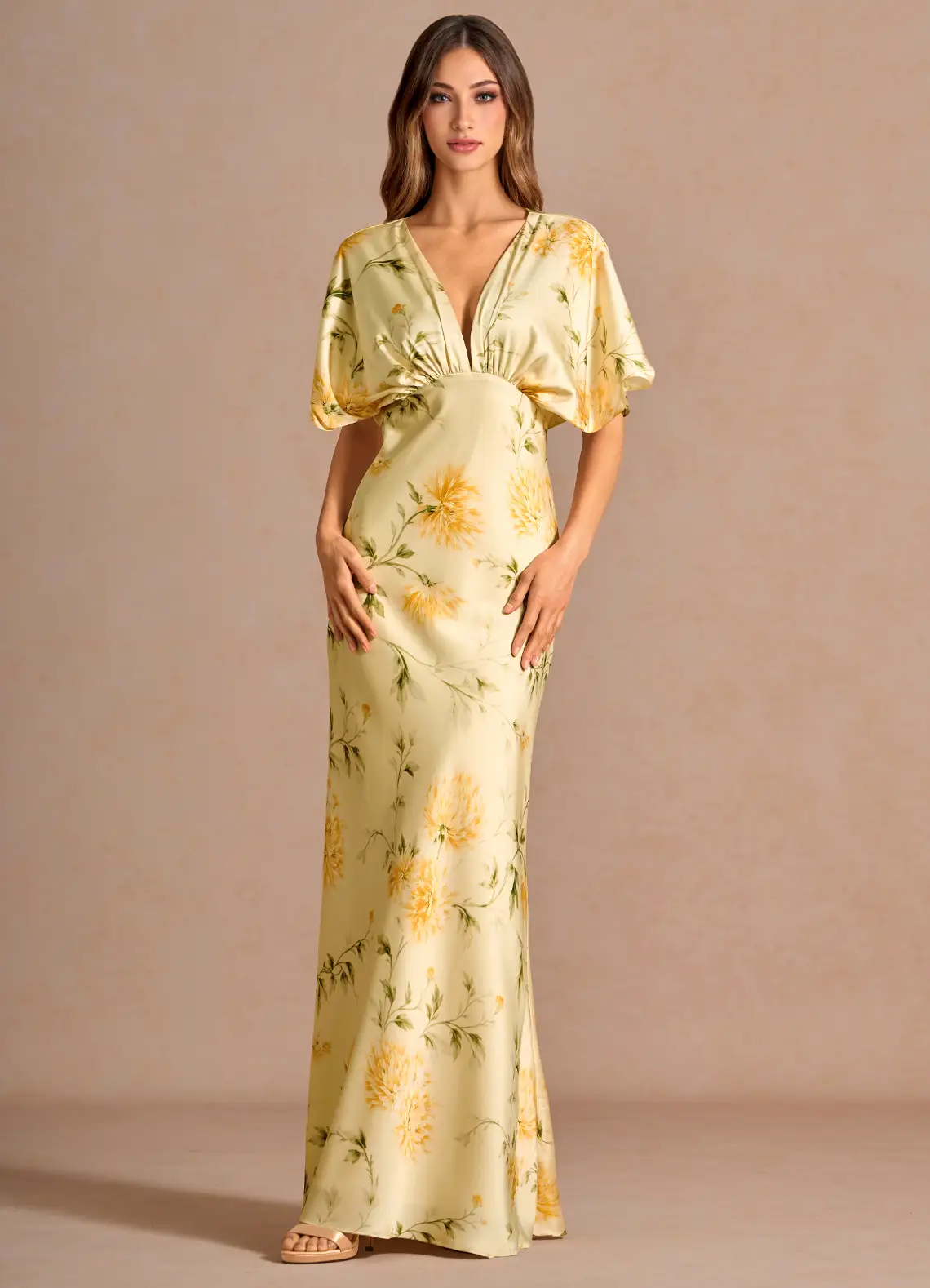 guest wearing lemon yellow floral print - flutter sleeve maxi for beach wedding