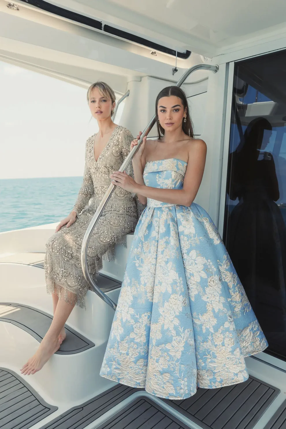 wedding guest wearing garden formal guest dress in floral brocade