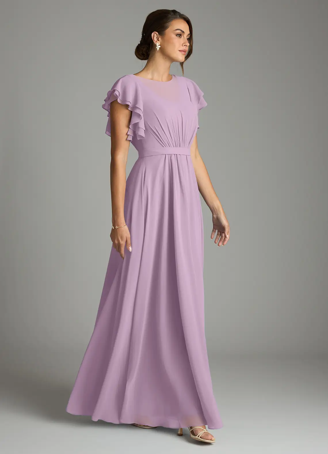 bridesmaid wearing modest dress in hot summer weather with chiffon floor length skirt and flutter sleeves