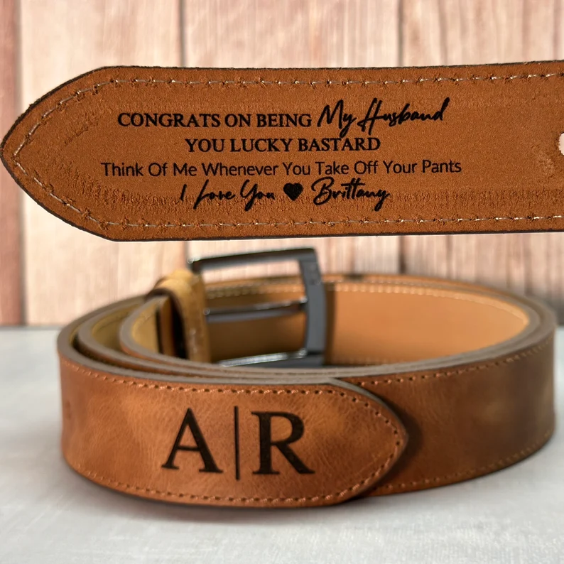 hidden message engraved on belt for groom gift from bride on wedding day